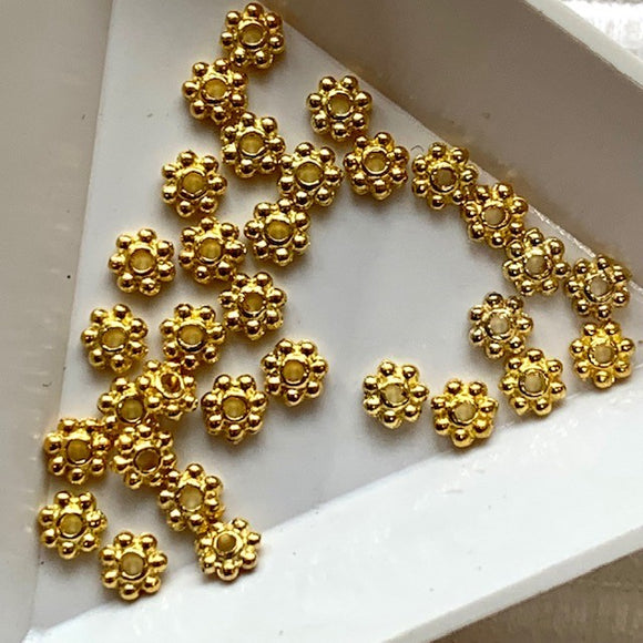 B0112  4.5mm Bali style Daisy spacer Gold colour