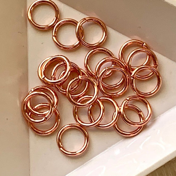 JR1036  Jump ring - 7mm OD, 18 gauge open ring Bright Copper plated