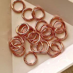 JR1036  Jump ring - 7mm OD, 18 gauge open ring Bright Copper plated